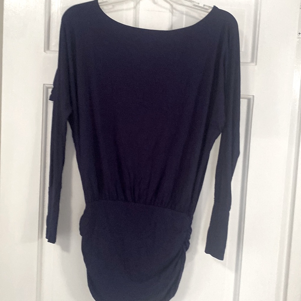 Navy blue puffy shirt with tight arm and waist band
